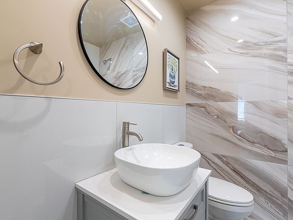Porcelain wall-to-ceiling in bathroom