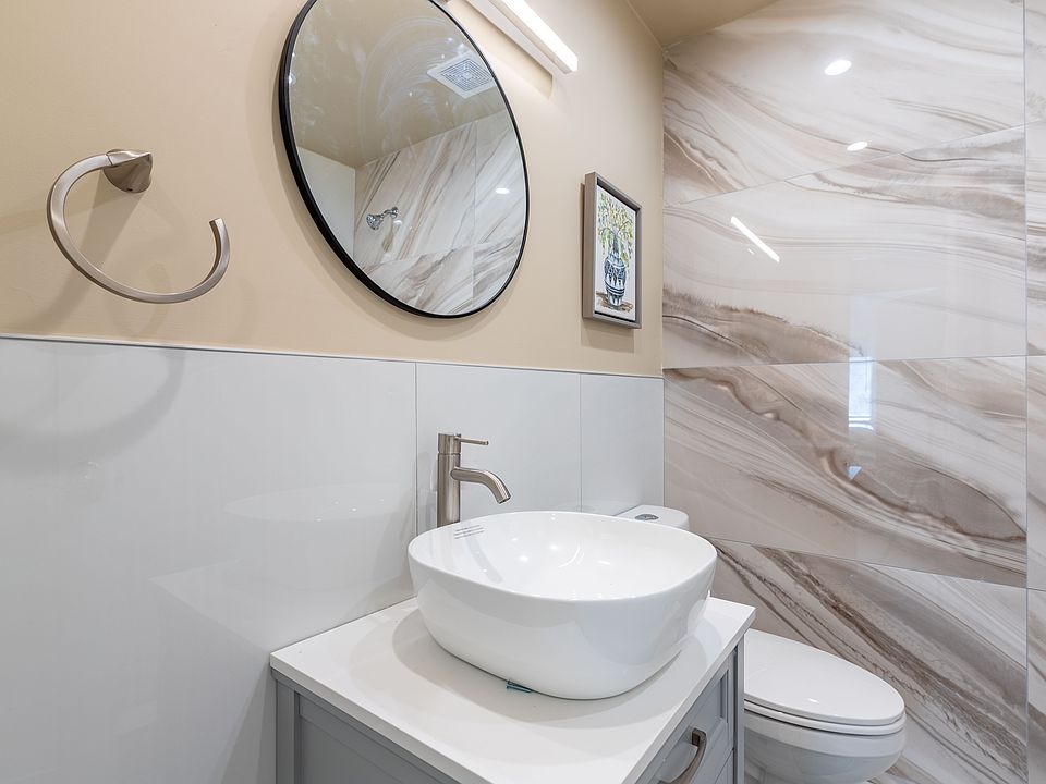 Porcelain wall-to-ceiling in bathroom
