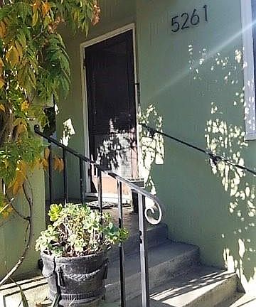 External Entry, covered front proch, with rod iron railings