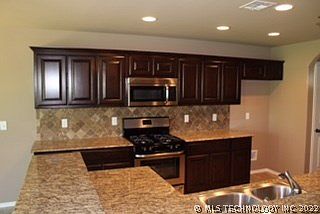 2nd image of 8555 E 160th St