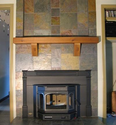 slate hearth, cedar mantle and Quadra-Fire woodstove insert