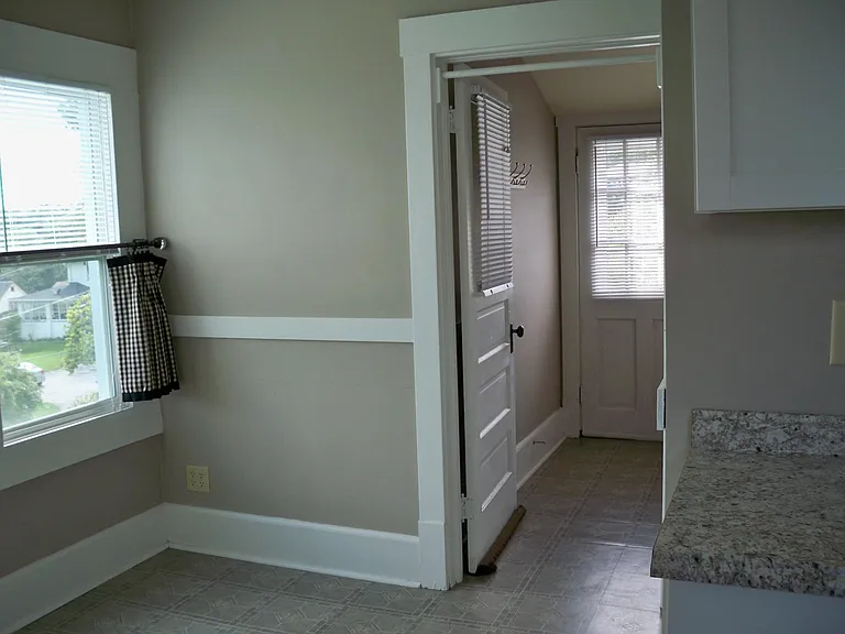 Kitchen 'mud-room' at back entrance.