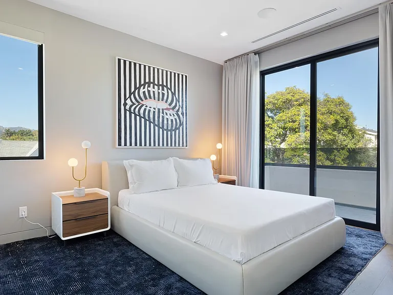Take in the serene views of the Hollywood Hills from the bedroom