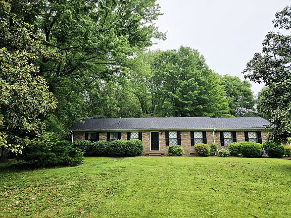 The home sits on a beautiful 1 acre lot with mature trees and plenty of shade in the fenced backyard.