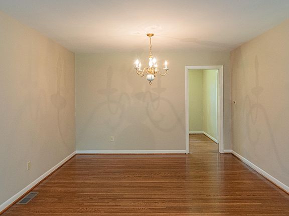 FORMAL DINING ROOM ADJACENT TO LIVING ROOM