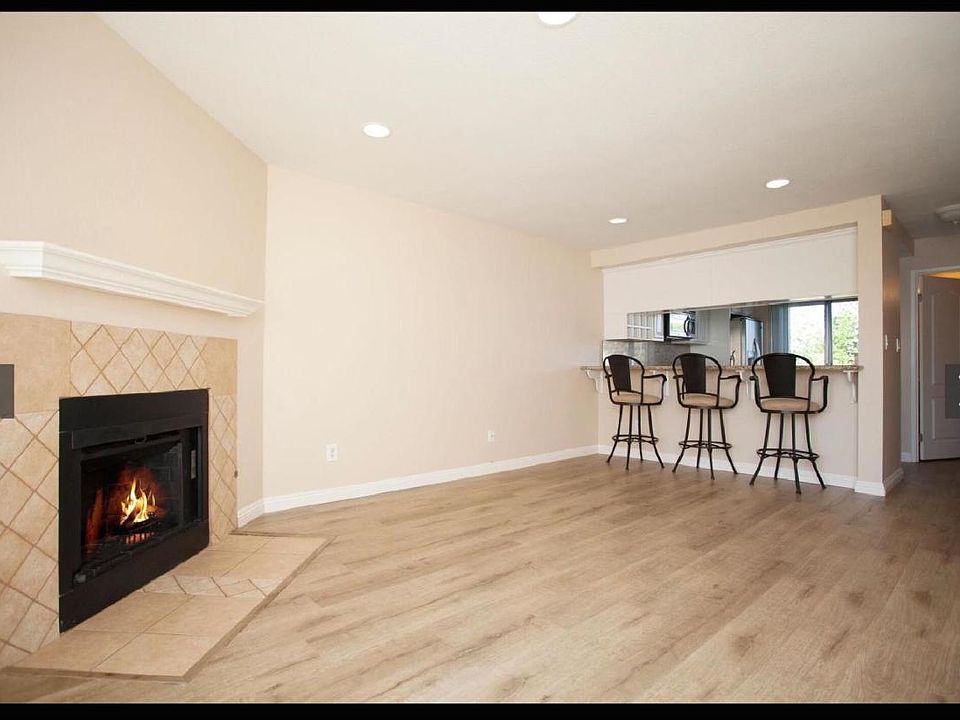 living room with open concept style into kitchen