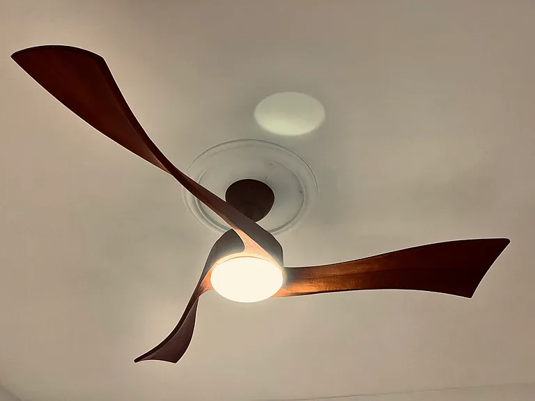 Custom wood ceiling fans that match the era of the room.