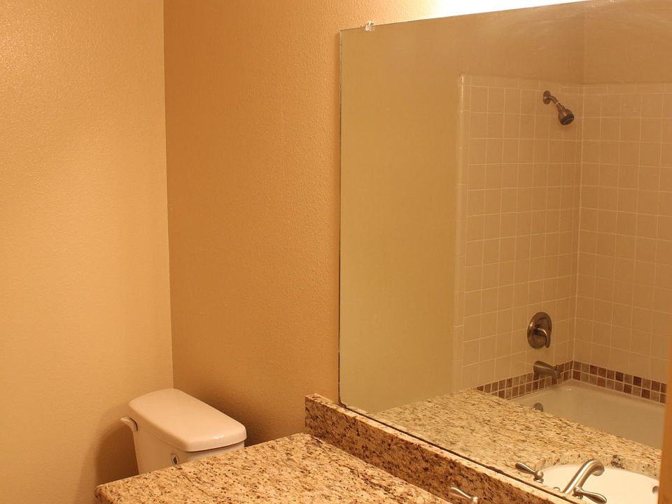 Granite counters in bathrooms with upgraded fixtures