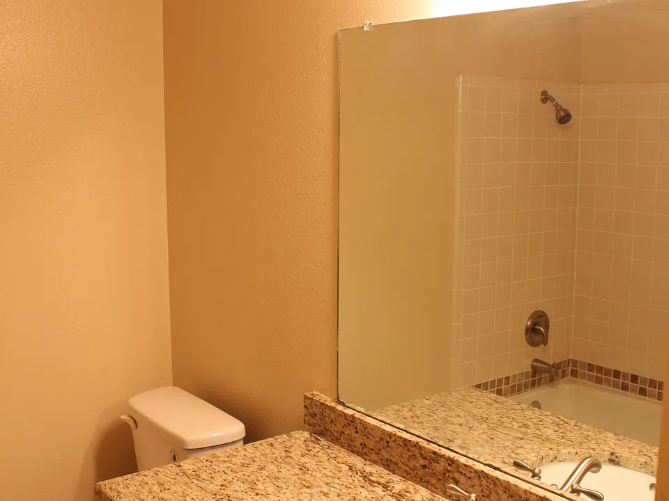 Granite counters in bathrooms with upgraded fixtures