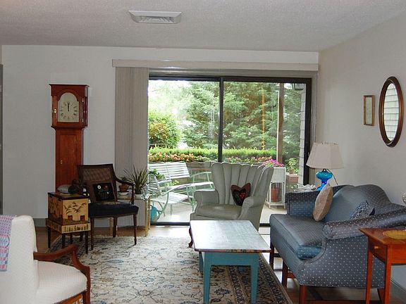 Spacious Living Room Looks Out To Garden Patio
