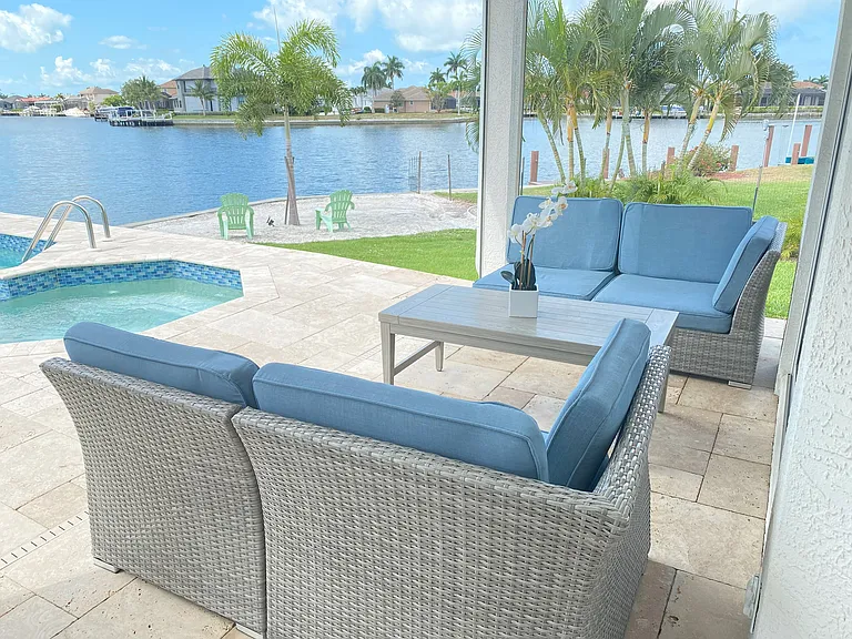 garden furniture by the water. Spectacular view. Covered terrace facing south