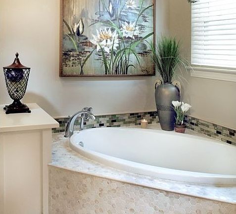 Large soaking tub with tile surround
