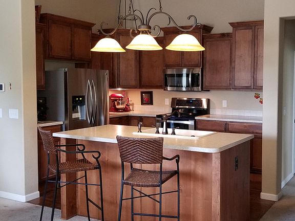 Kitchen with 12-foot ceiling.