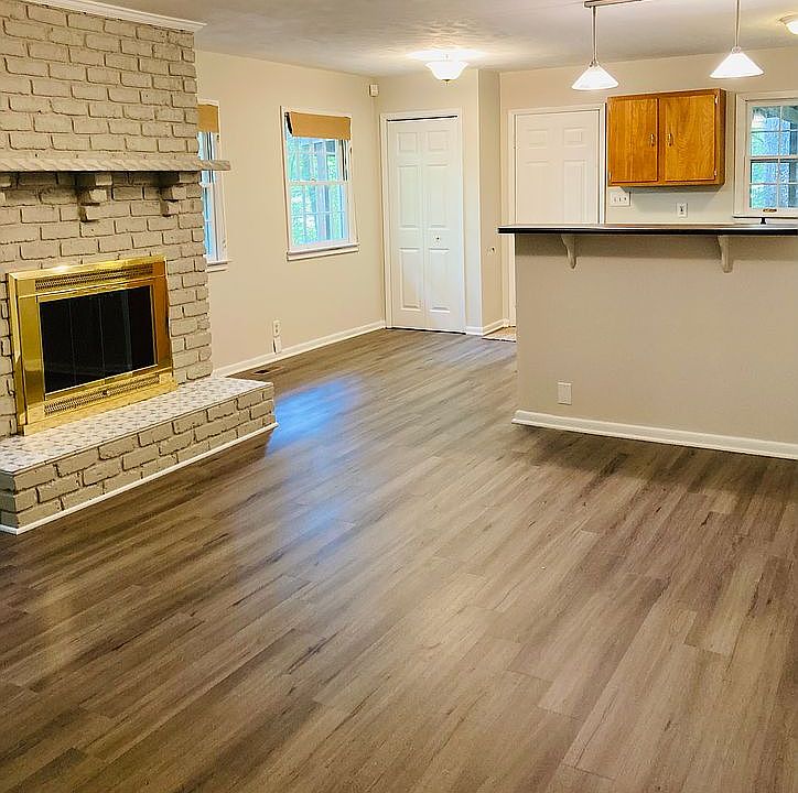 Den with fireplace 
