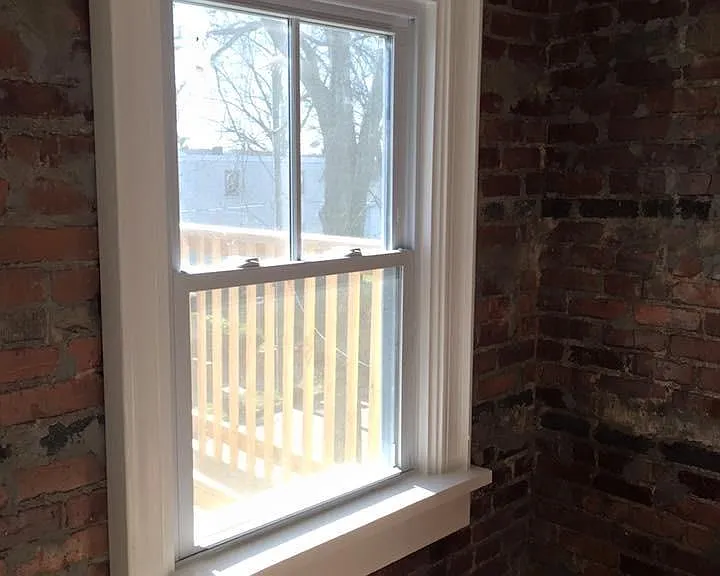 Front bedroom. Window out to deck.