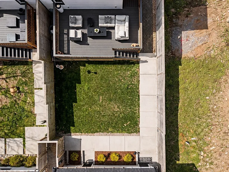 Large rear deck perfect for outdoor dining and entertaining.