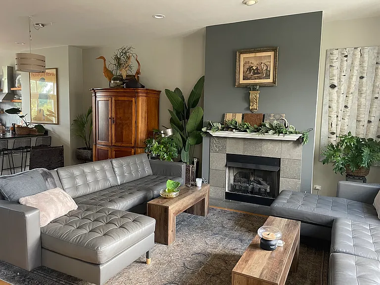 Living room with lots of seating and gas fireplace