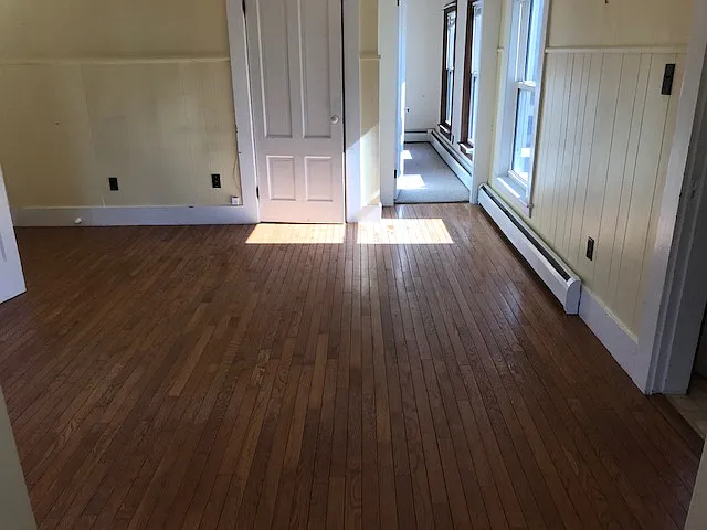 View of living room while standing at bathroom door.