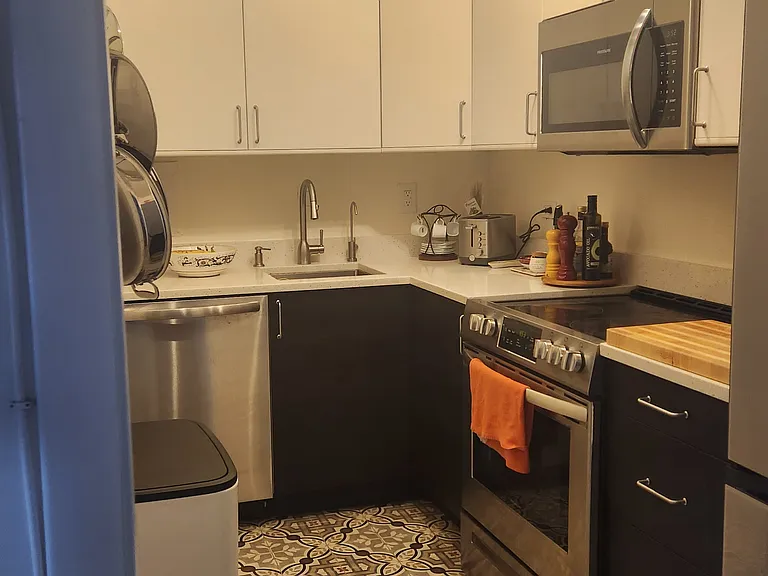 The kitchen was recently renovated in June 2022. Includes a drinking water filter in the sink.