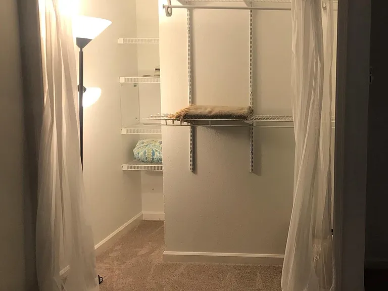 Large closet, with soft cloth doors, for ease of access.