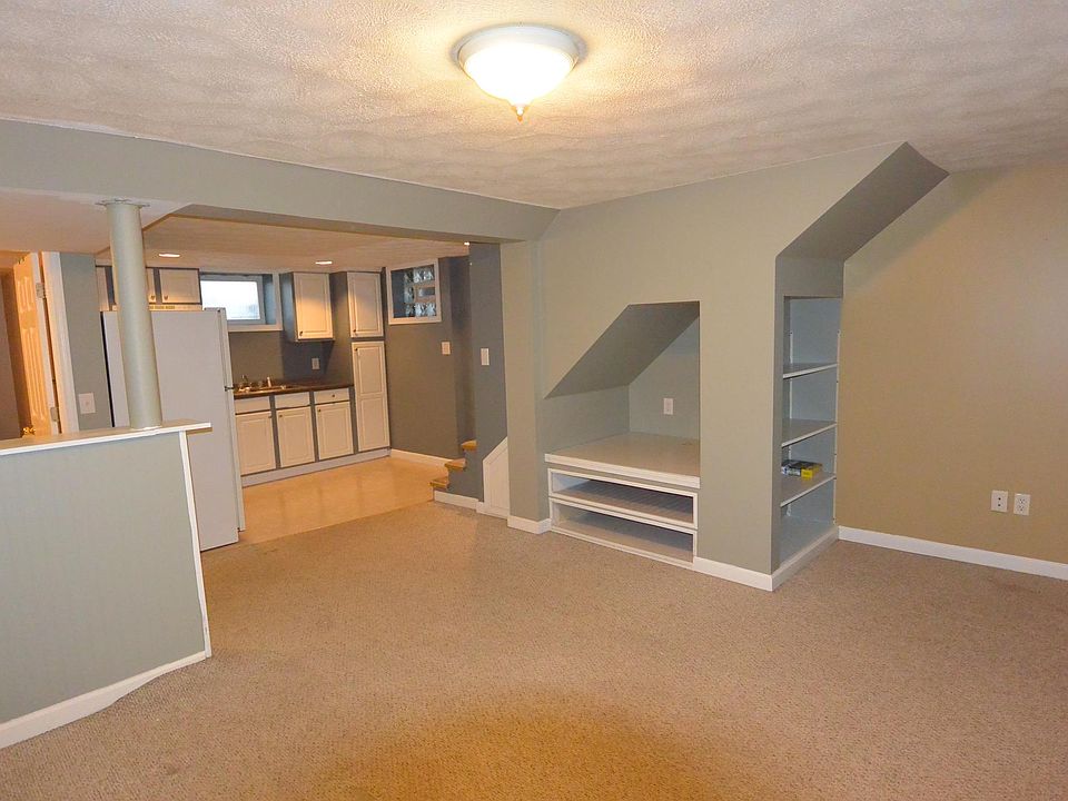 Living room, TV nook and desk nook