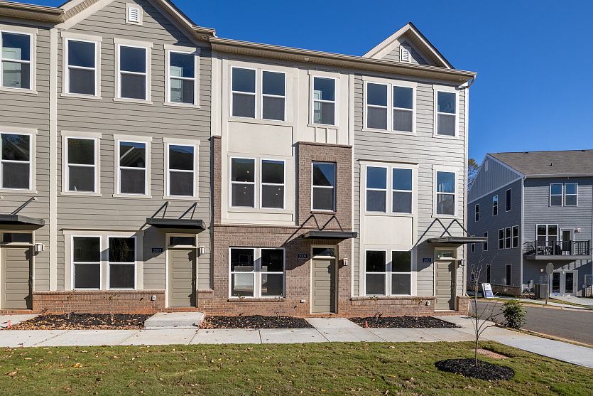 Evans Exterior 6 features siding, brick, covered front door and 1-car tandem rear load garage