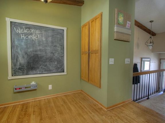 Breakfast nook w/ pantry cupboard.