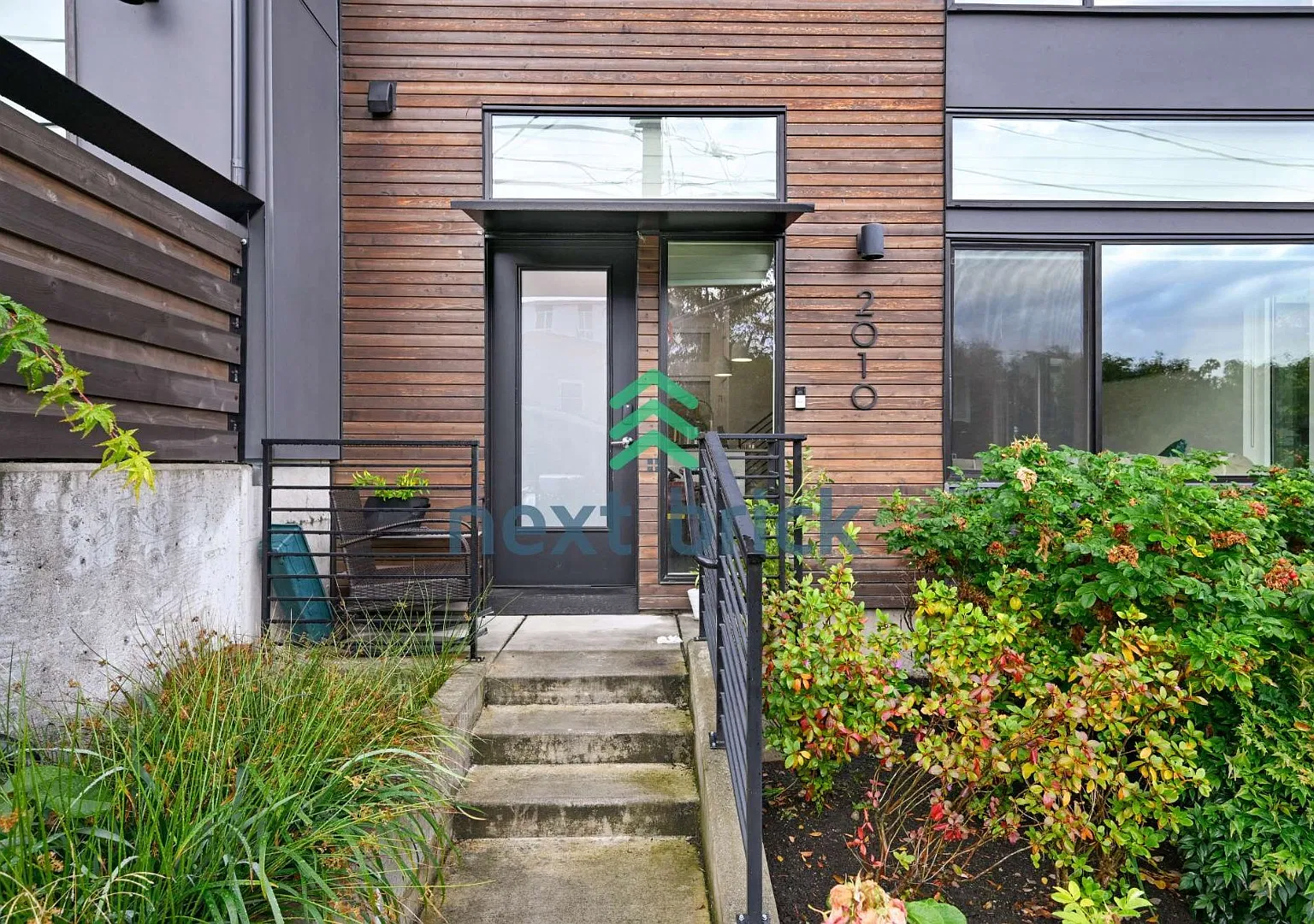 "Modern 3-Bedroom End-Unit Townhome with Spacious Deck, Quartz Kitchen & Convenient Transit Access" — Photo 4