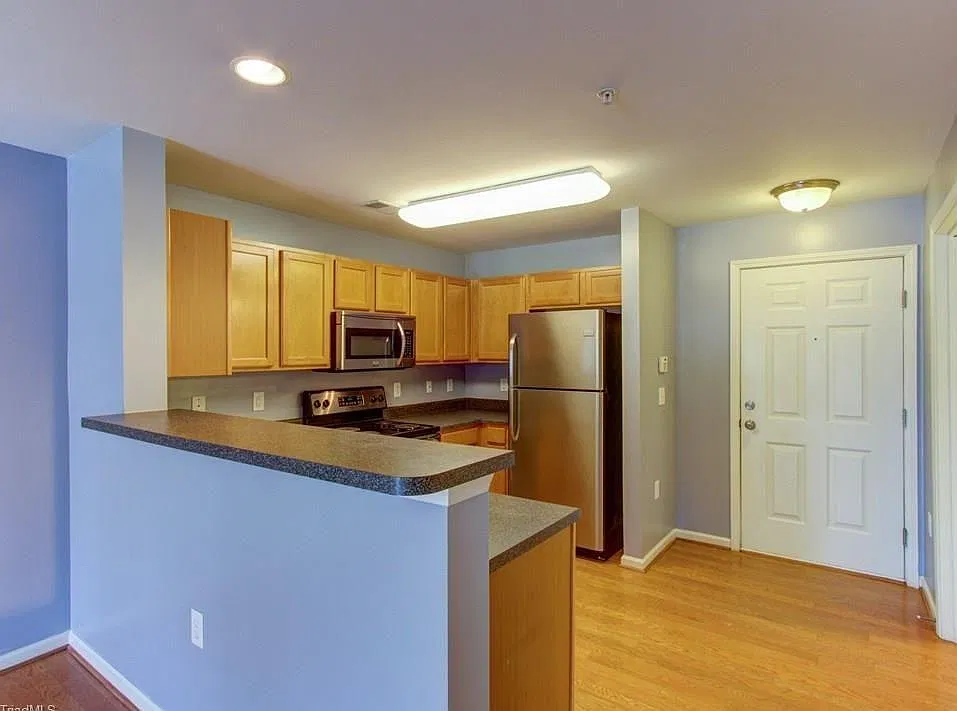 7108 W Friendly Ave — Photo 2
