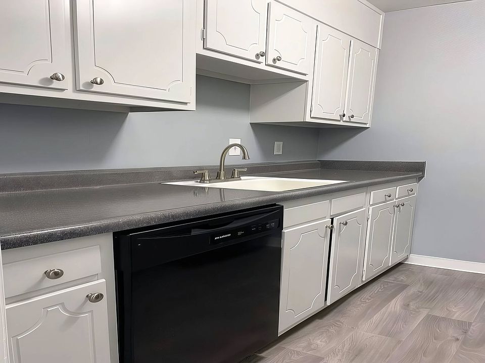 Welcome to The Forest Apartments, where modern design meets everyday functionality. This beautifully appointed kitchen features sleek finishes and ample storage, perfect for your culinary adventures. Schedule a tour today and envision your new home!
