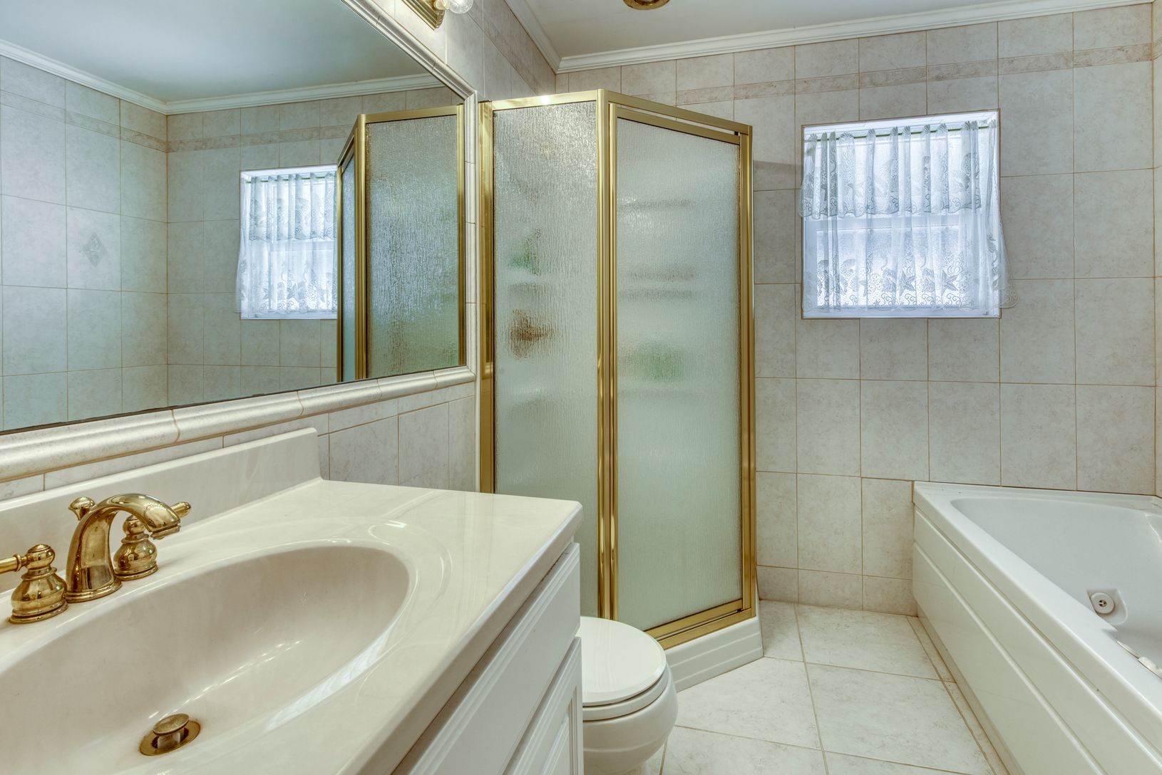  Guest bath with tub and shower.