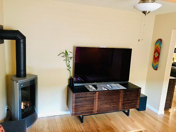Nice warm gas fireplace and 65" LG OLED TV