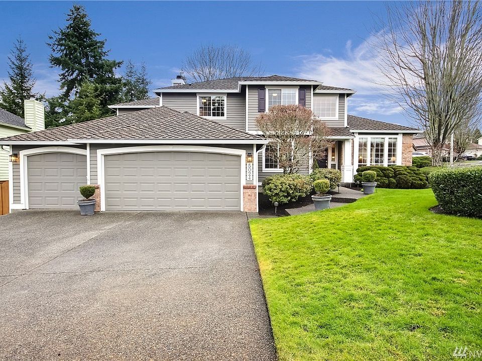 Beautiful 2 story home situated on a corner lot with real wood siding, 50 year Presidential roof, new paint, gutters,garage doors & garage openers! Wait till you see the inside.