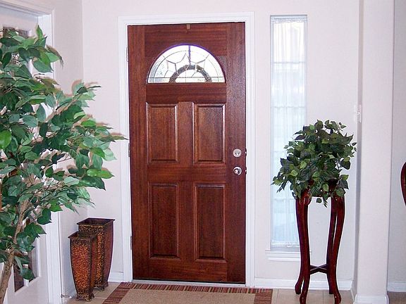 Extended ceramic tile in entry