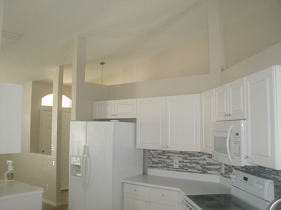 vaulted ceiling over kitchen