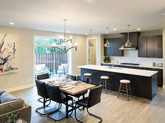 Dining Room and Kitchen - Photos are from a similar home