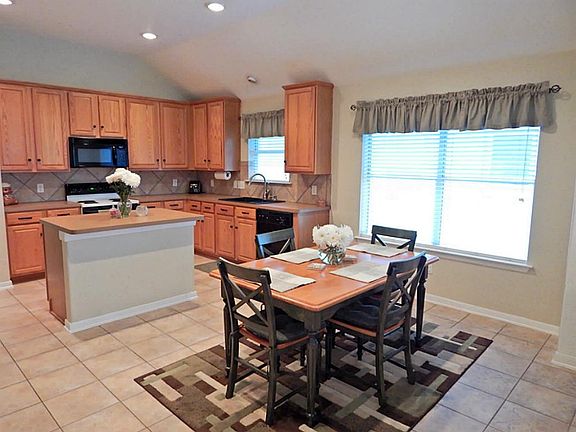 Kitchen is open to breakfast area.