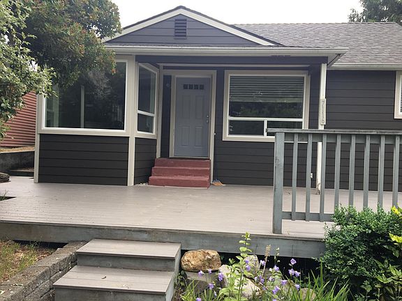 entrance to house with large deck
