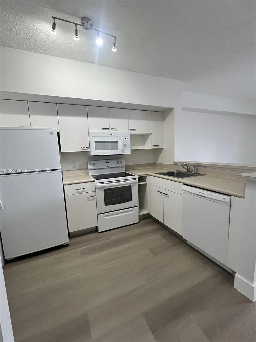 Photo 2 of 13 - 5085 NW 7th St #503 - Miami, FL Building Photo - 5085 NW 7th St #503
