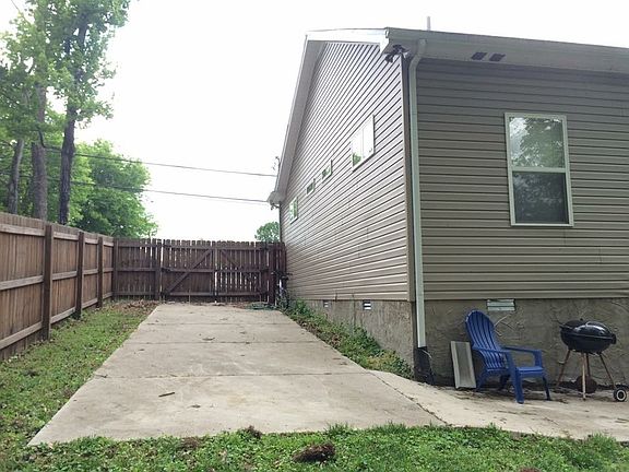 Driveway behind gated fence