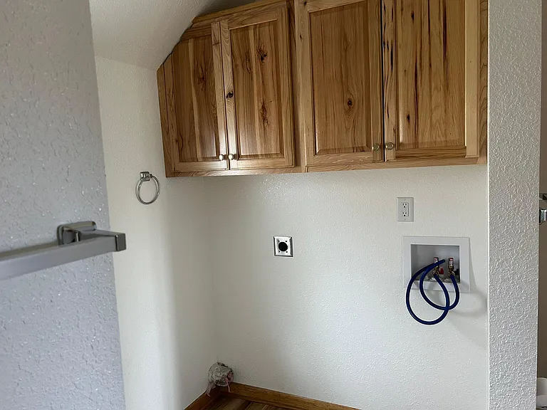 Washer dryer hook-ups in bathroom