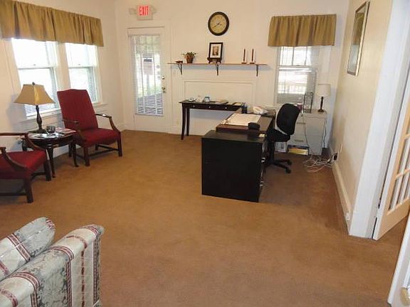 lobby from hall showing door off screen porch
