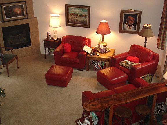 An inviting living room with a gas log fireplace.