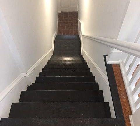 Entry stairwell looking at the front door.