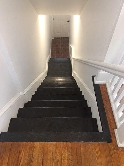 Entry stairwell looking at the front door.
