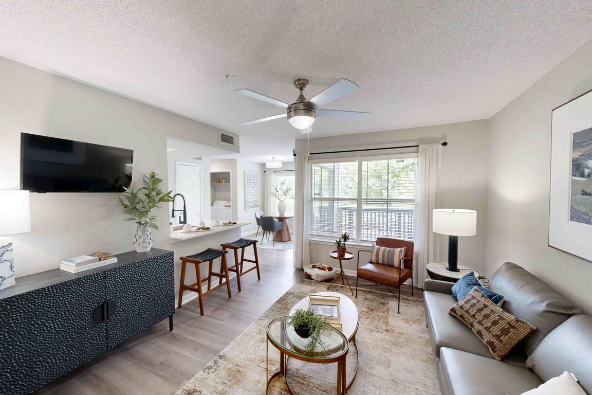 Cozy Living Room with Quartz Countertops and Stainless Steel Appliances