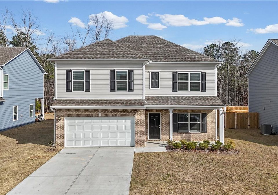 1st image of 23 Whistling Oaks Dr
