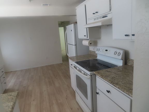 Remodeled Kitchen with Granite Countertops, New Floor, Eat In Area, Appliances