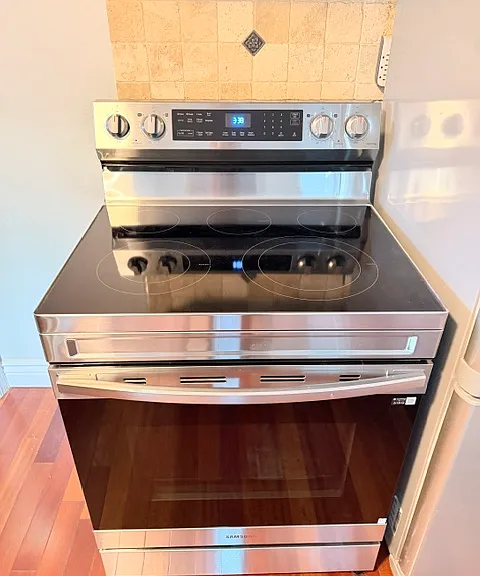 Brand new Samsung induction stove and electric oven. Never been used.