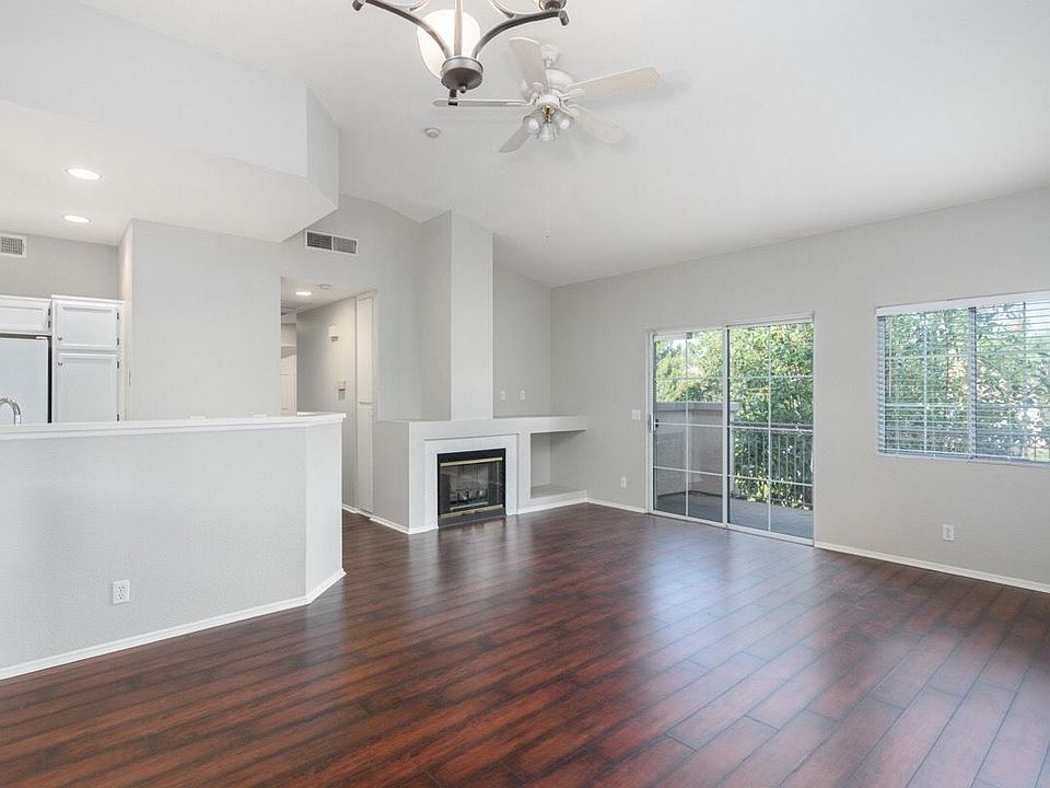 Hardwood like flooring and high vaulted ceilings